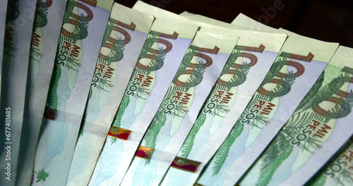 Fan of Colombian money bills pesos COP photo