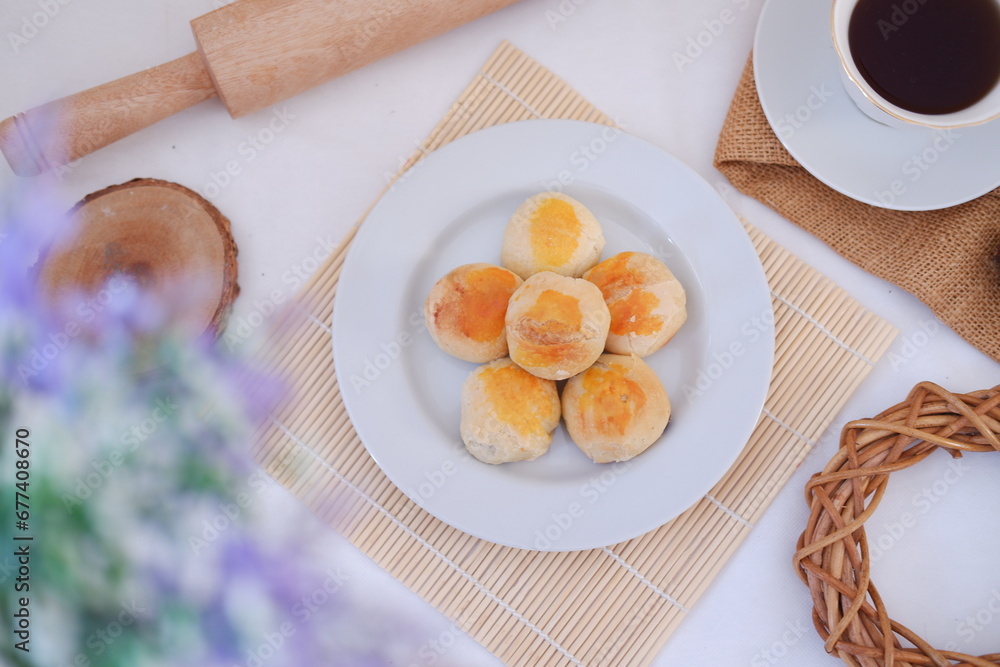 Bakpia, Bakpia Pathok is a typical Yogyakarta food made from a mixture of green beans, cheese and sugar, which is wrapped in flour, then baked. Bakpia, Bakpia Pathok is a typical Yogyakarta food made from a mixture of green beans, cheese and sugar, which is wrapped in flour, then baked.