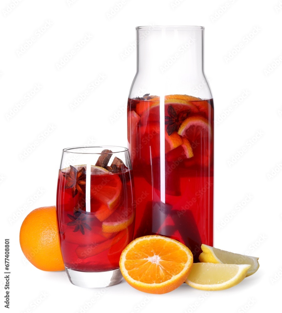 Tasty punch drink and ingredients isolated on white Tasty punch drink and ingredients isolated on white