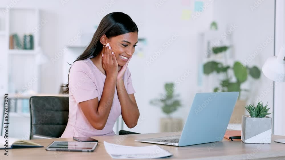 Cheerful business woman typing on a laptop, reading her email and dancing with excitement. Lucky and happy female shocked while receiving good news about successful deal or loan approval for startup Cheerful business woman typing on a laptop, reading her email and dancing with excitement. Lucky and happy female shocked while receiving good news about successful deal or loan approval for startup