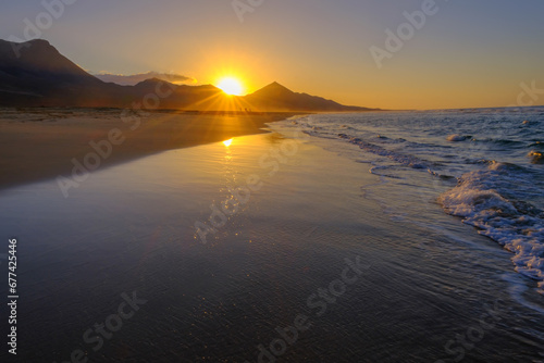 Sunset on Cofete beach on the Canary island Fuerteventura, Spain. © Elena Krivorotova