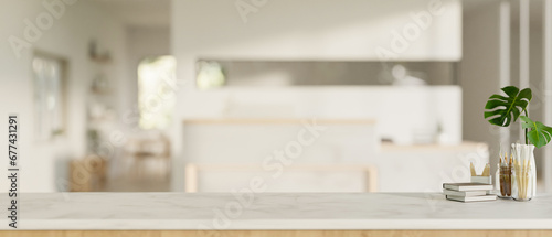 Copy space on a white table over a blurred background of a modern white office lobby with a counter.
