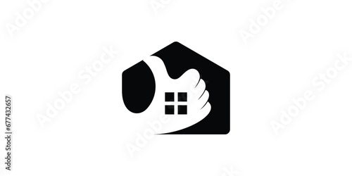 logo design combining the shape of a house with a hand. photo