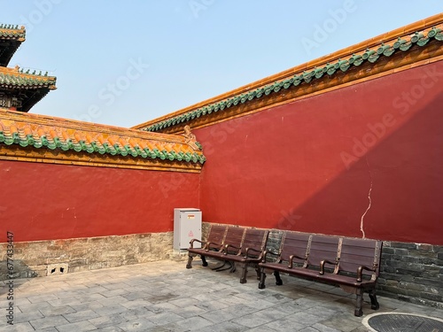 chinese temple roof and red brick wall, Beijing, China