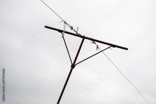 metal pipe, antenna, lamp, against the sky © Prikhodko