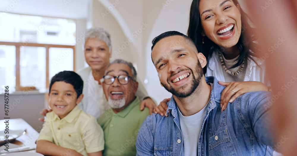 Obraz premium Happy, big family and selfie in home at dinner, party or together with freedom on holiday or vacation. Parents, child and grandparents smile for social media, memory and photography of event in house