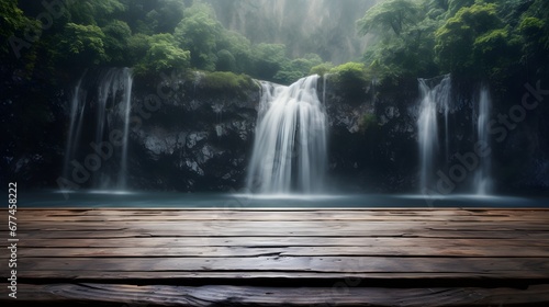 The empty wooden table top with background of waterfall
