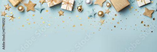 Christmas present gift boxes on a light blue background