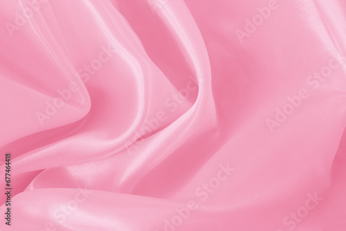 Pink fabric cloth texture for background and design art work, beautiful crumpled pattern of silk or linen.