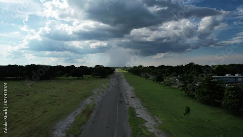 shot of abandoned airport runway in a very cloudy day in yucatan mexico photo