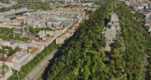 Prague Czechia Aerial v52 drone flyover Karlin capturing national memorial and history museum at Vítkov Hill and views of Zizkov cityscape and television tower - Shot with Mavic 3 Cine - November 2022 photo