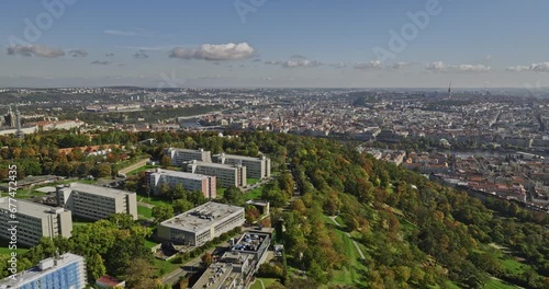 Prague Czechia Aerial v44 drone flyover Petrin hill capturing urban park and gardens, elevation cityscape views of Mala Strana and Old Town across Vltava river - Shot with Mavic 3 Cine - November 2022 photo