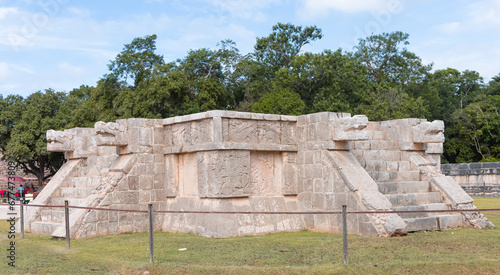 Two large snake heads carved from stone at the ancient Mayan ruins at Chichen Itza, Mexico.