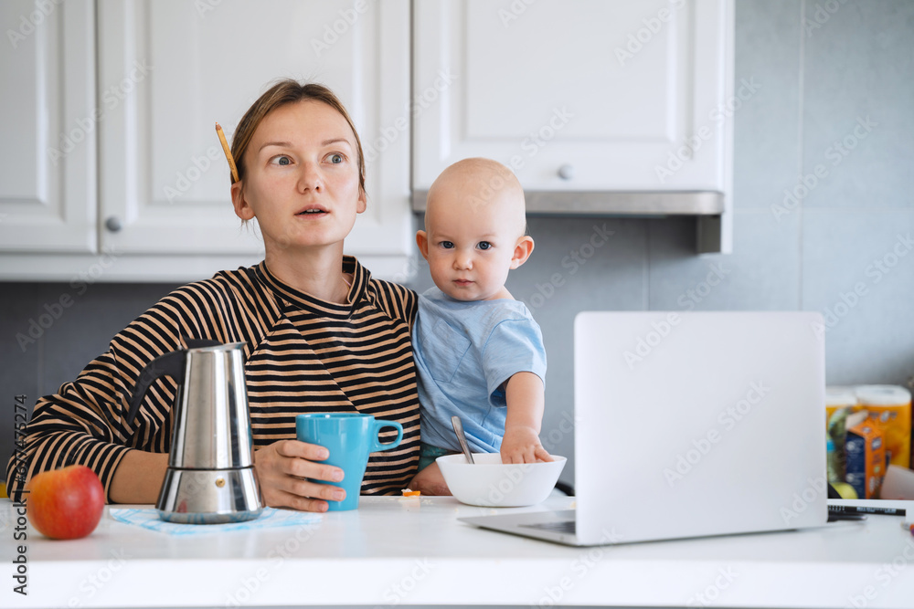 Mother balancing between work and baby on sick or maternity leave. Mother balancing between work and baby on sick or maternity leave.