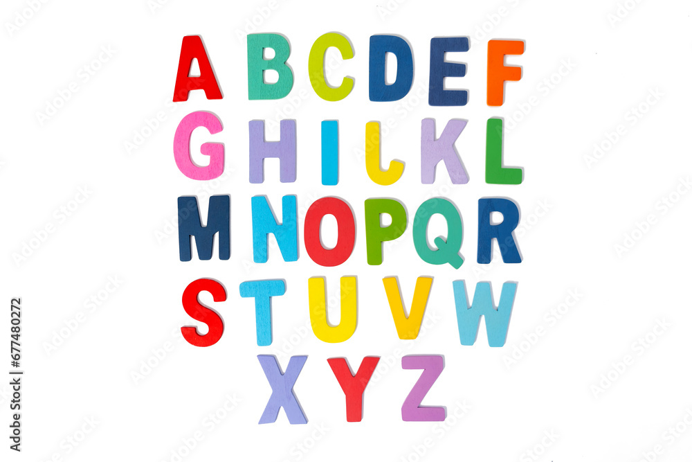 Wooden block capital letters ABC letters including several punctuation symbols isolated over white background.