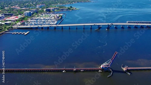 Manatee River Bridge And CSX Train Bridge Across Manatee River In Bradenton, Florida. aerial sideways photo