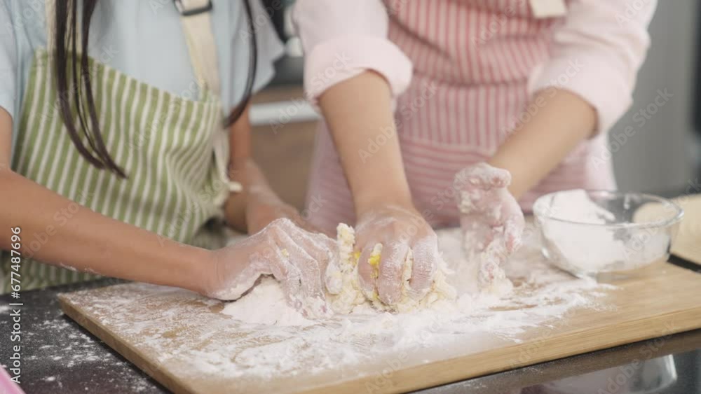 multi-generational family baking together at home multi-generational family baking together at home
