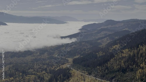 Autumn Elevation: Bird's Eye Glimpse of Cloud-Blanketed Little Fort and Highway 24 photo