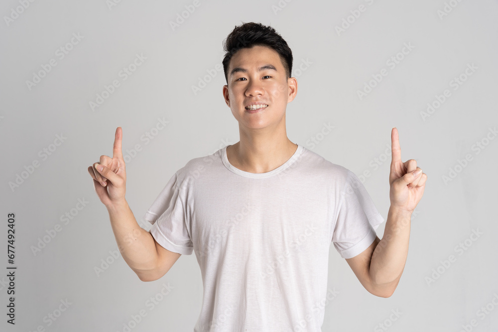 Portrait of Asian man posing on white background Portrait of Asian man posing on white background