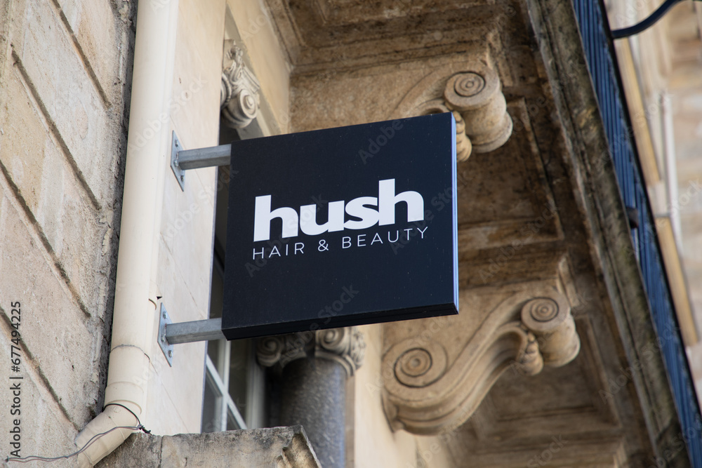 Hush hair and beauty logo brand entrance and text sign front entrance