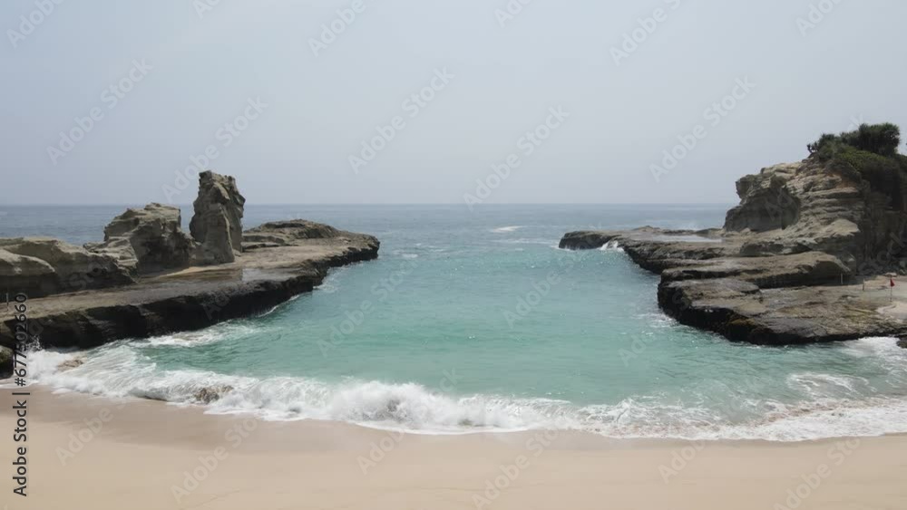 aerial view of Klayar Beach which has the charm of white sand and beautiful white coral in Pacitan, Indonesia aerial view of Klayar Beach which has the charm of white sand and beautiful white coral in Pacitan, Indonesia