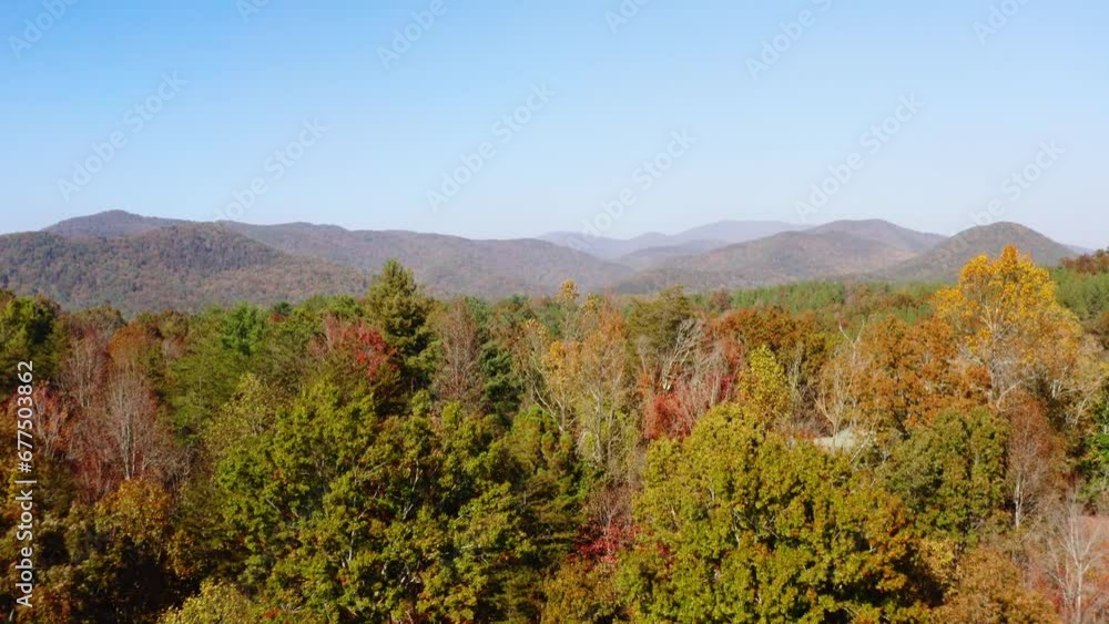 Drone shot slowly flying over the Fall colors in the North Georgia Mountains Drone shot slowly flying over the Fall colors in the North Georgia Mountains
