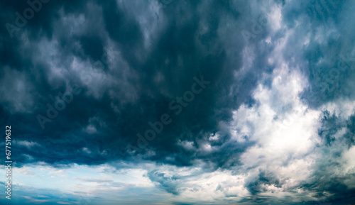 Dramatic storm clouds over panoramic scenic horizon.
