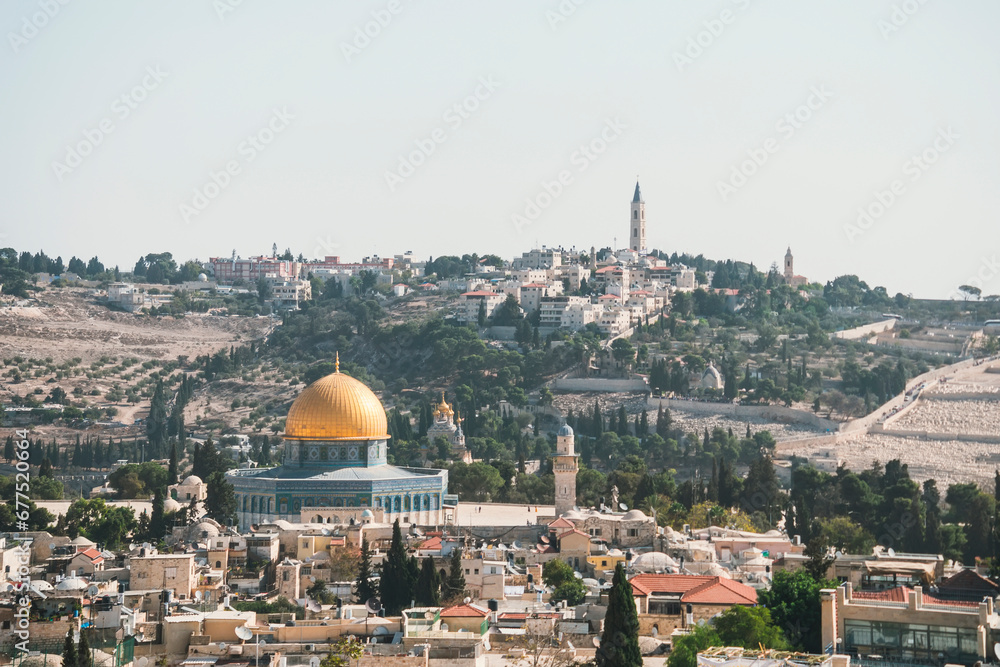 Obraz premium Jerusalem, Israel, aerial view of the golden dome of the Dome of the Rock, an Islamic shrine located on the Temple Mount in the Old City of Jerusalem. Ancient Jewish city shot at fine sunny day.