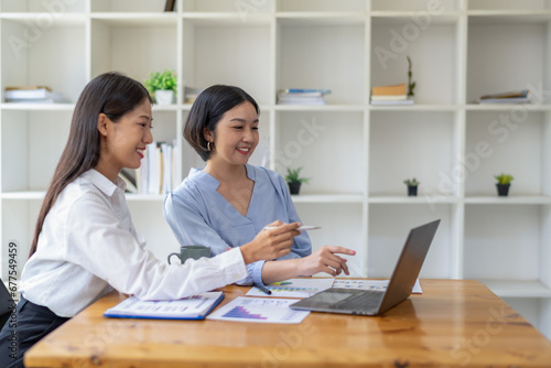 Two business worker consult and plan together. Brainstorm, share, and discuss business project ideas.