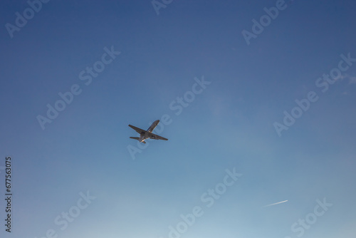 Airplane against blue sky