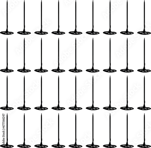 A set of nails standing on heads in even rows
