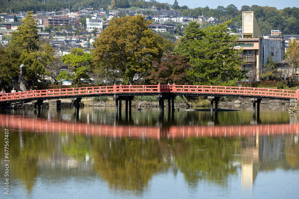 Matsumoto castle with red bridge in spring 10 12 2023 Matsumoto castle with red bridge in spring 10 12 2023