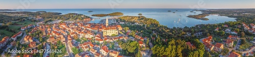 Panoramic drone picture of the Croatian harbor town of Vrsar on the Limski Fjord from the church bell tower photo