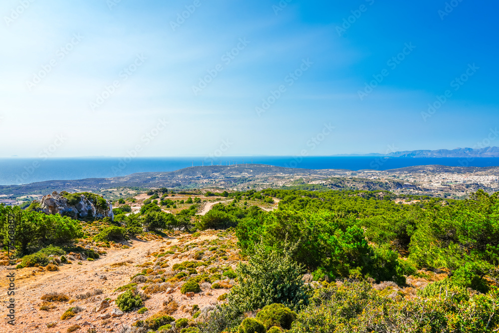 View of the landscape and the Mediterranean Sea from a mountain on the Greek island of Kos.	