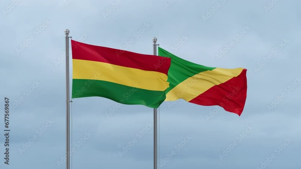 Republic of the Congo flag and Bolivia flag waving together on cloudy sky, endless seamless loop, two country relations concept Republic of the Congo flag and Bolivia flag waving together on cloudy sky, endless seamless loop, two country relations concept