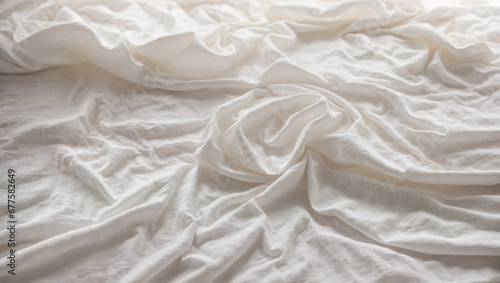 Abstract white crumpled linen background. Creased wrinkled white fabric, bedding sheets, white blanket texture background Top view