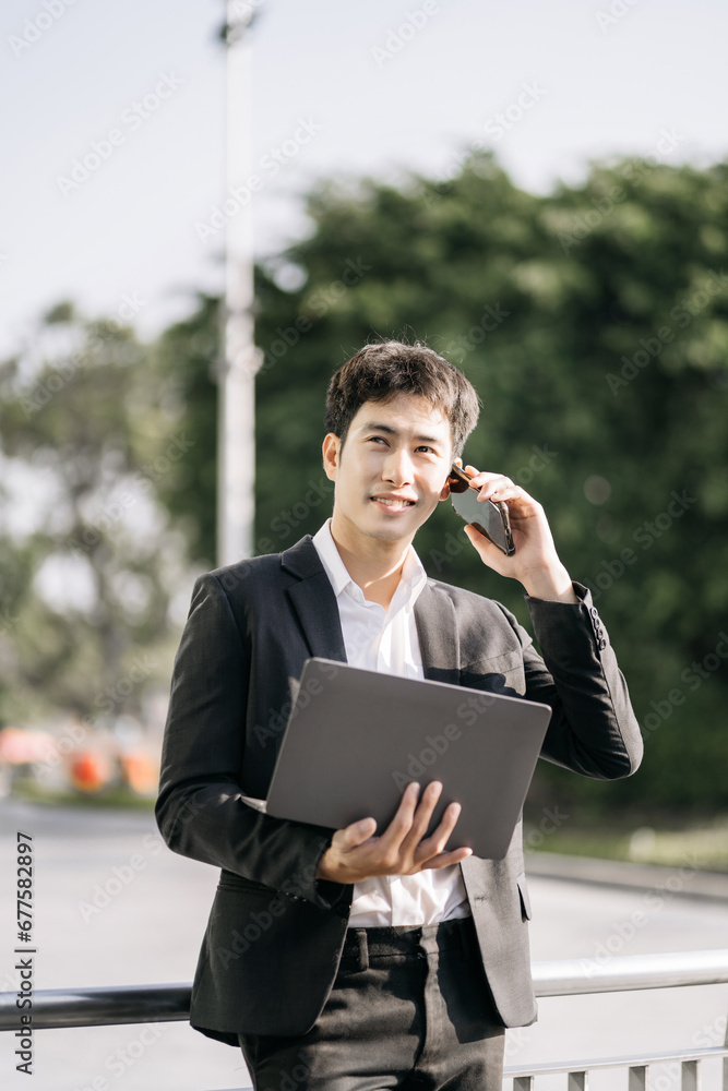 Businessman talking on the phone giving professional consultation to client or negotiating project. Businessman talking on the phone giving professional consultation to client or negotiating project.