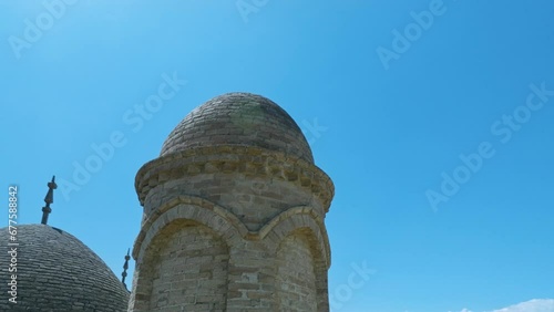 Brick Minaret On The Facade Of Arystan Bab Mausoleum In Kazakhstan. drone pullback orbit photo