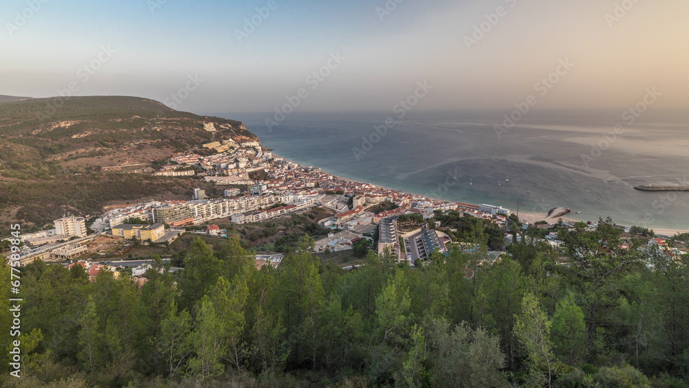 Aerial view of the coastline of the village of Sesimbra timelapse. Portugal