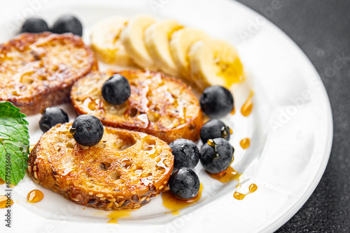 French toast sweet breakfast berries, banana pancakes fresh delicious cooking appetizer meal food snack on the table copy space