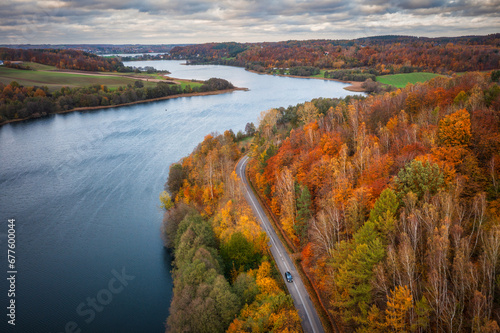 Fotografie Autumnal landscape of Kashubian lakes and forests, Poland