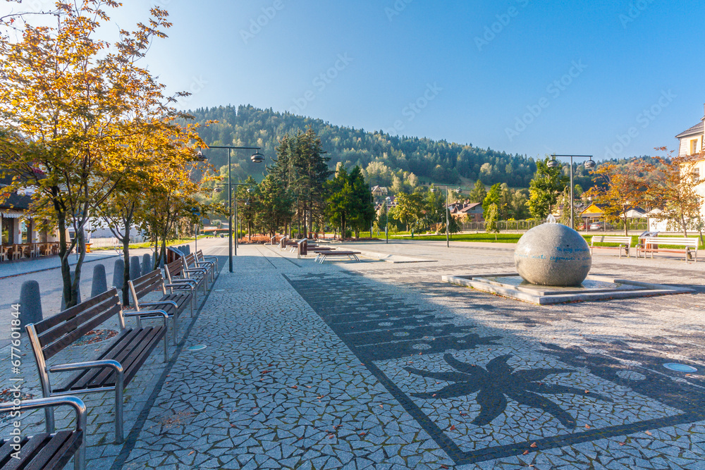 St. Jacob Square in the center of the tourist town - Szczyrk in the Silesian Beskids (Poland) on a sunny autumn morning.