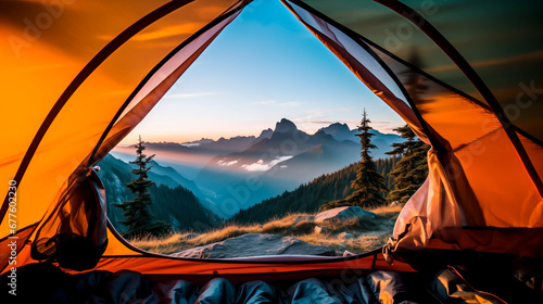 Sunrise view from inside a tent overlooking mountains.