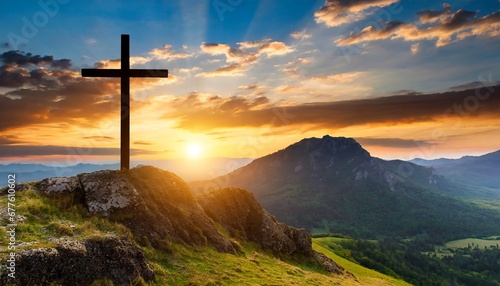 One cross on the mountain with sunset.  #677610602