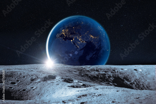 Moon with craters in deep space. Moon and Earth at night. Elements of this image furnished by NASA. © Paopano