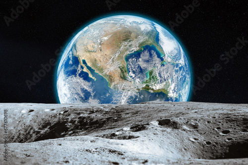 Fototapeta Naklejka Na Ścianę i Meble -  View from the Moon with craters on Earth in deep space. Moon and Earth. Elements of this image furnished by NASA.