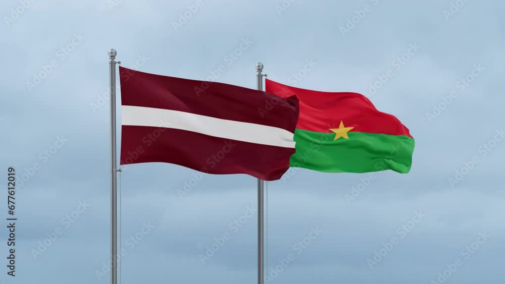 Burkina Faso flag and Latvia flag waving together on cloudy sky, endless seamless loop, two country relations concept Burkina Faso flag and Latvia flag waving together on cloudy sky, endless seamless loop, two country relations concept