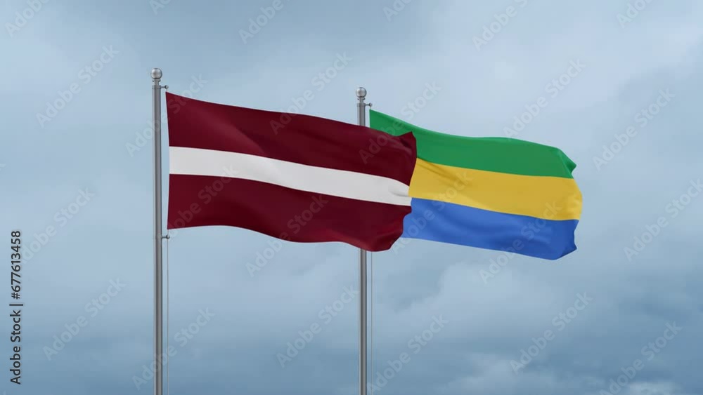Gabon flag and Latvia flag waving together on cloudy sky, endless seamless loop, two country relations concept Gabon flag and Latvia flag waving together on cloudy sky, endless seamless loop, two country relations concept