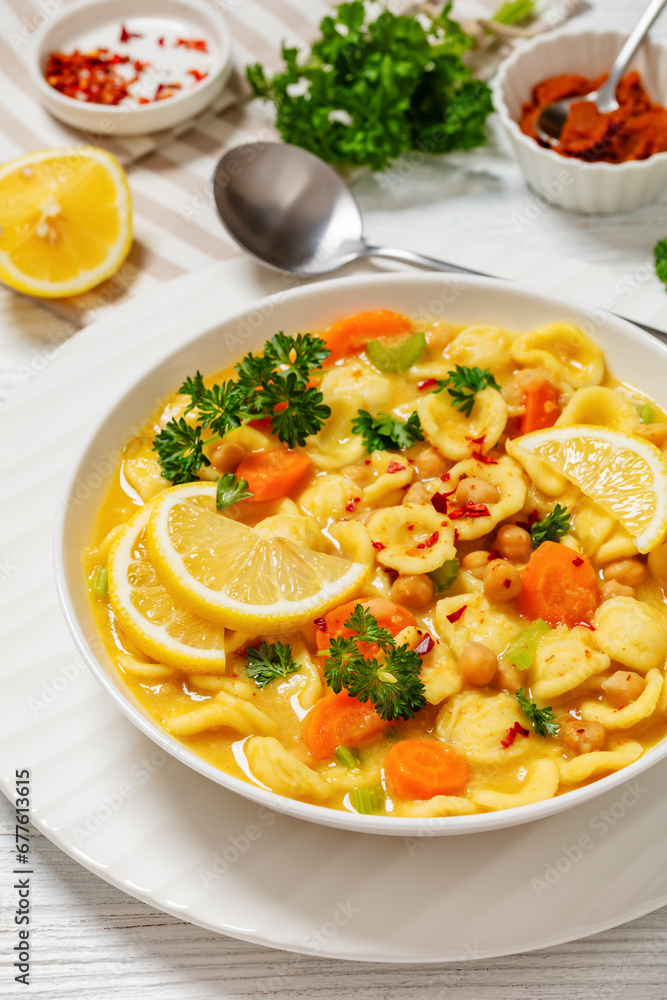 orecchiette pasta chickpea soup in white bowl orecchiette pasta chickpea soup in white bowl