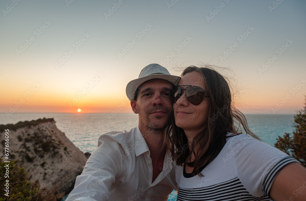 Young couple on their honeymoon in Greece